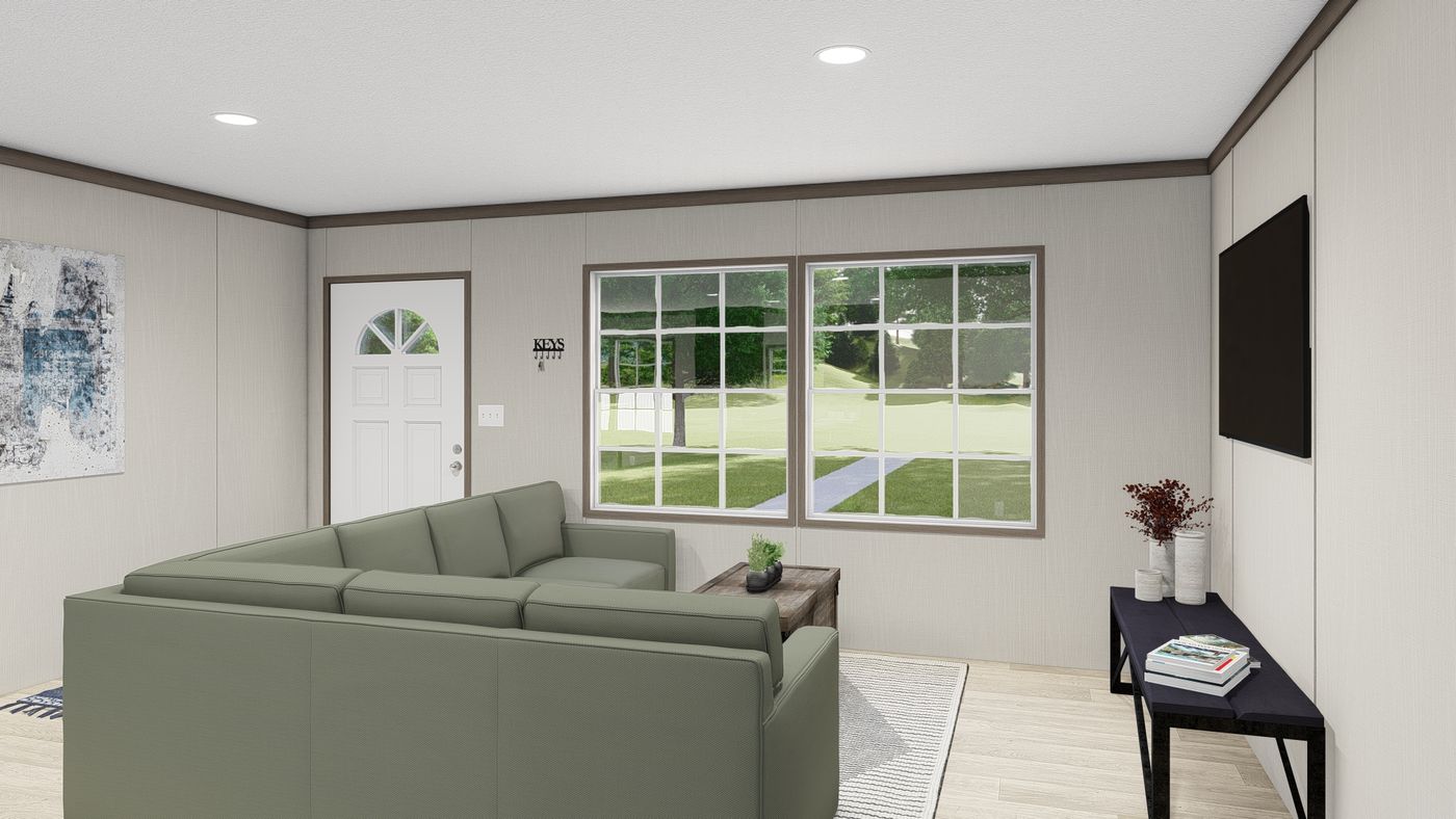 The ULTRA PRO 3 BR 28X60 Living Room. This Manufactured Mobile Home features 3 bedrooms and 2 baths.