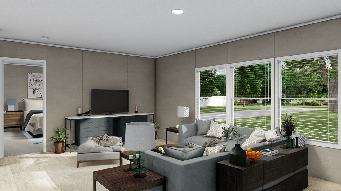 The ULTRA BREEZE 28X76 Living Room. This Manufactured Mobile Home features 4 bedrooms and 2 baths.