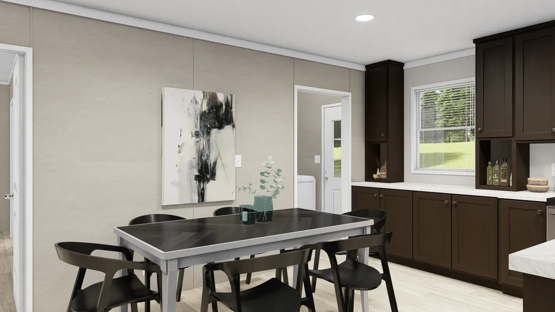 The ULTRA PRO 3 BR 28X56 Dining Area. This Manufactured Mobile Home features 3 bedrooms and 2 baths.