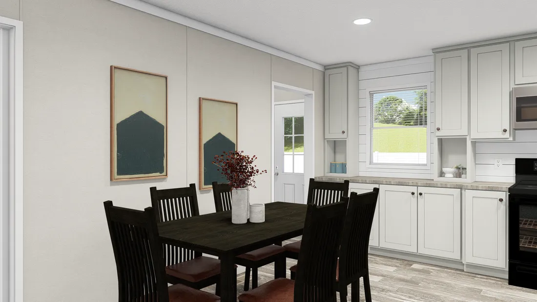 The ULTRA PRO 4 BR 28X56 Dining Area. This Manufactured Mobile Home features 4 bedrooms and 2 baths.