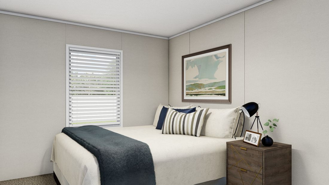The LEGEND 28X56 Bedroom. This Manufactured Mobile Home features 3 bedrooms and 2 baths.