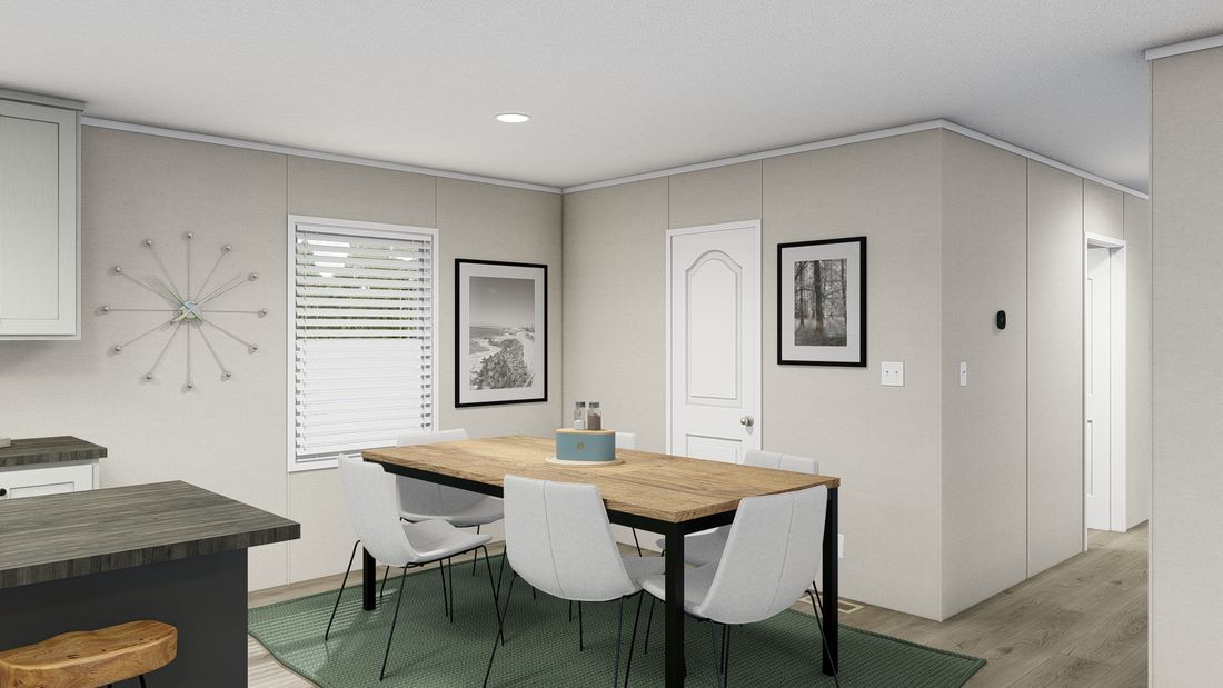 The LEGEND 28X56 Dining Area. This Manufactured Mobile Home features 3 bedrooms and 2 baths.