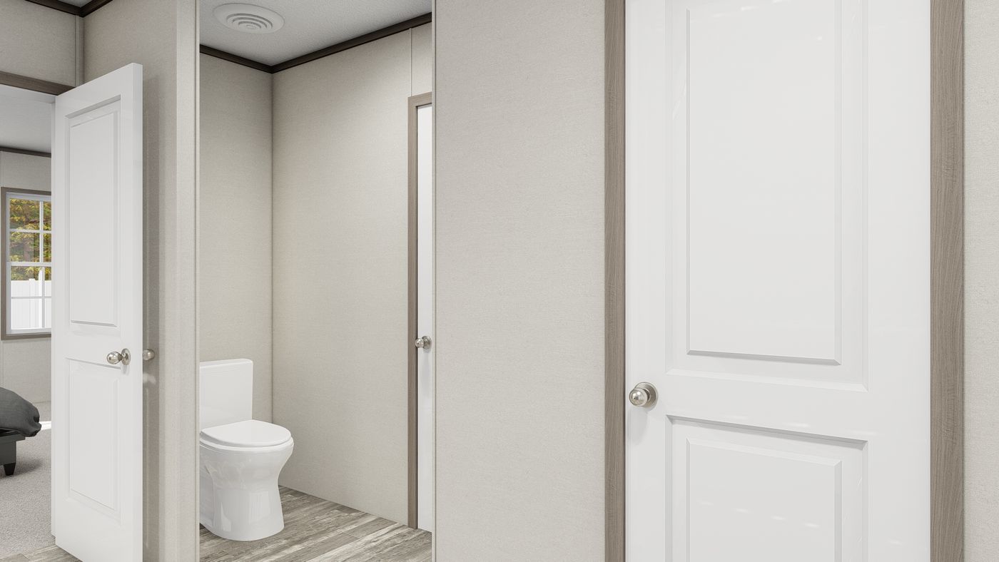 The ULTRA BREEZE 28X52 Primary Bathroom. This Manufactured Mobile Home features 3 bedrooms and 2 baths.