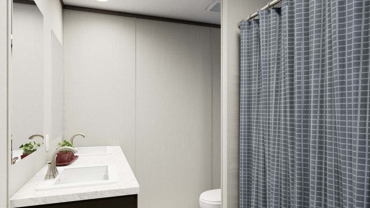 The ULTRA BREEZE 28X76 Guest Bathroom. This Manufactured Mobile Home features 4 bedrooms and 2 baths.