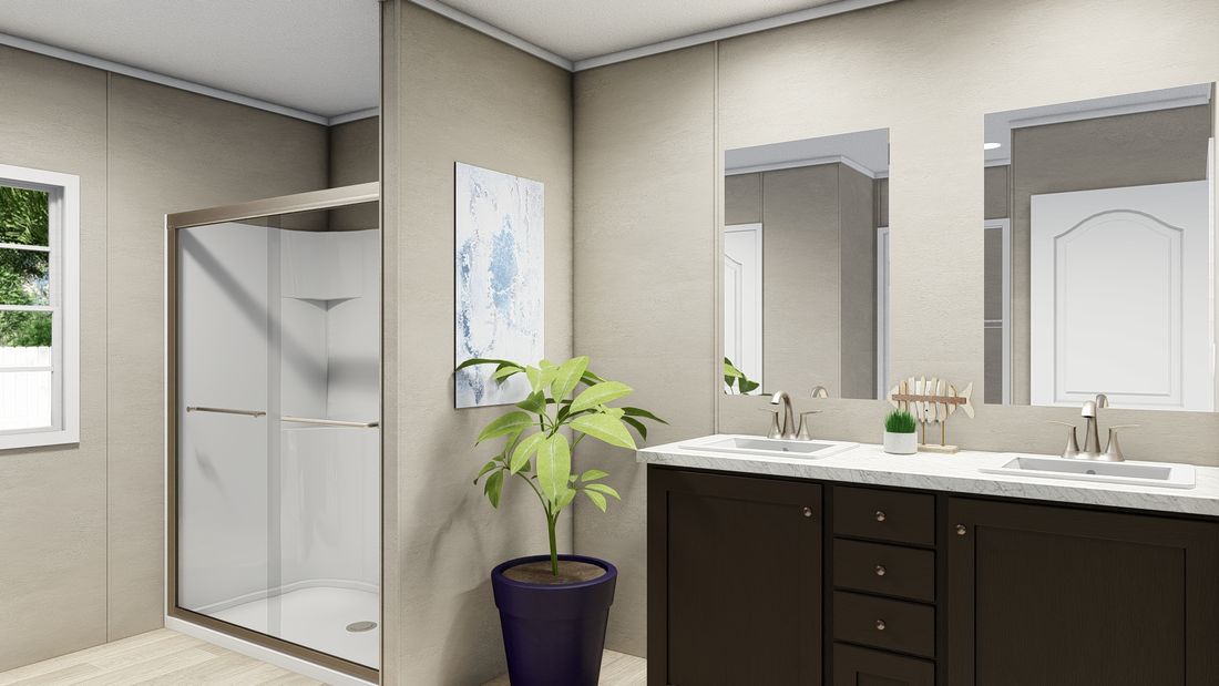 The ULTRA BREEZE 28X76 Primary Bathroom. This Manufactured Mobile Home features 4 bedrooms and 2 baths.