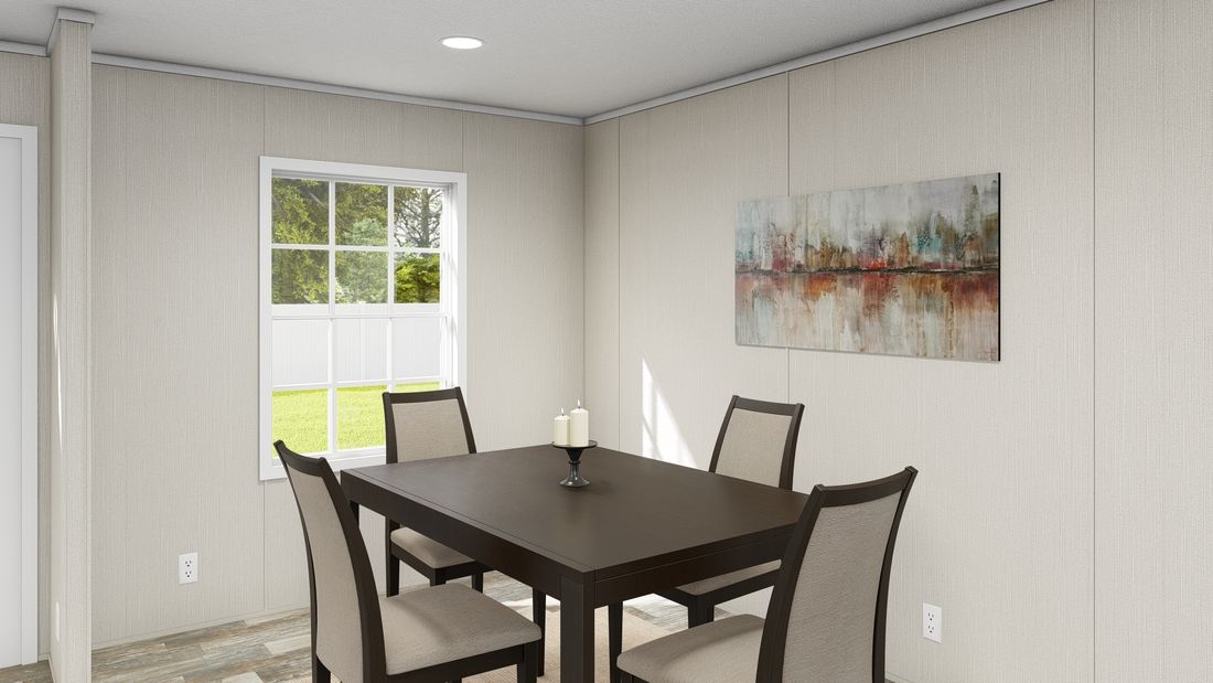 The ULTRA ISLAND BREEZE 56' Dining Room. This Manufactured Mobile Home features 3 bedrooms and 2 baths.