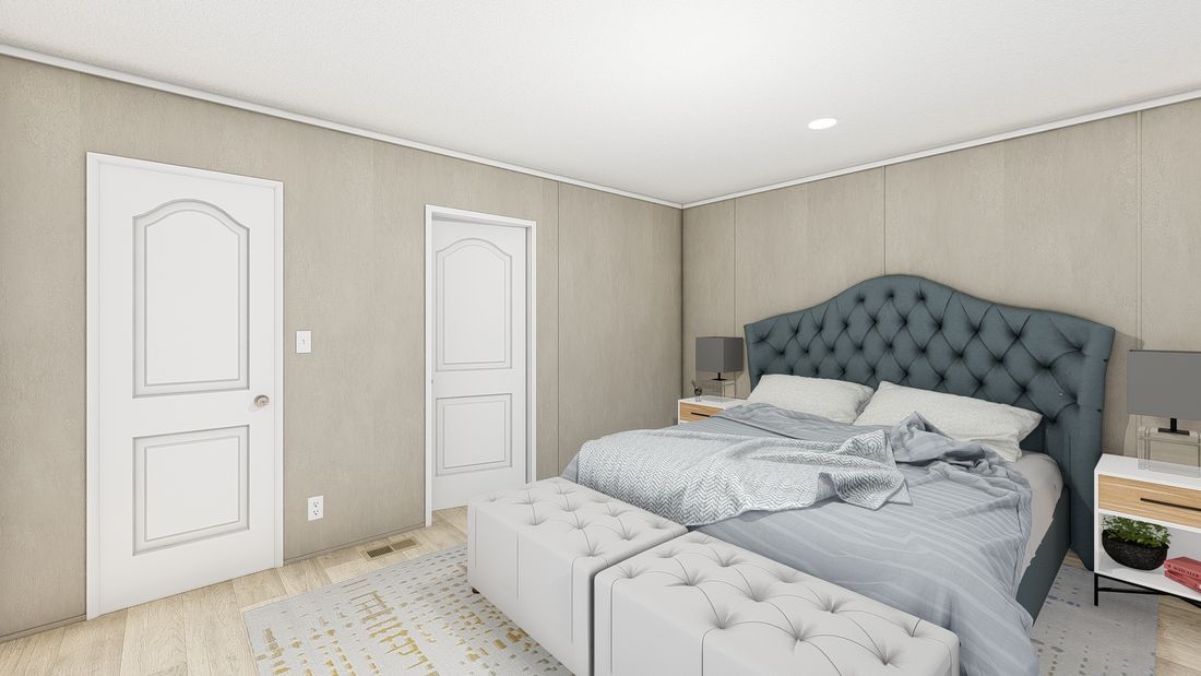 The LEGEND FLEX 16X76 Primary Bedroom. This Manufactured Mobile Home features 3 bedrooms and 2 baths.